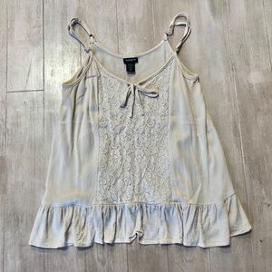 TORRID FRONT LACE AND RUFFLE TANK